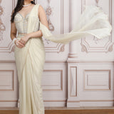 A Fluid Ivory Saree With Embroidered Blouse
