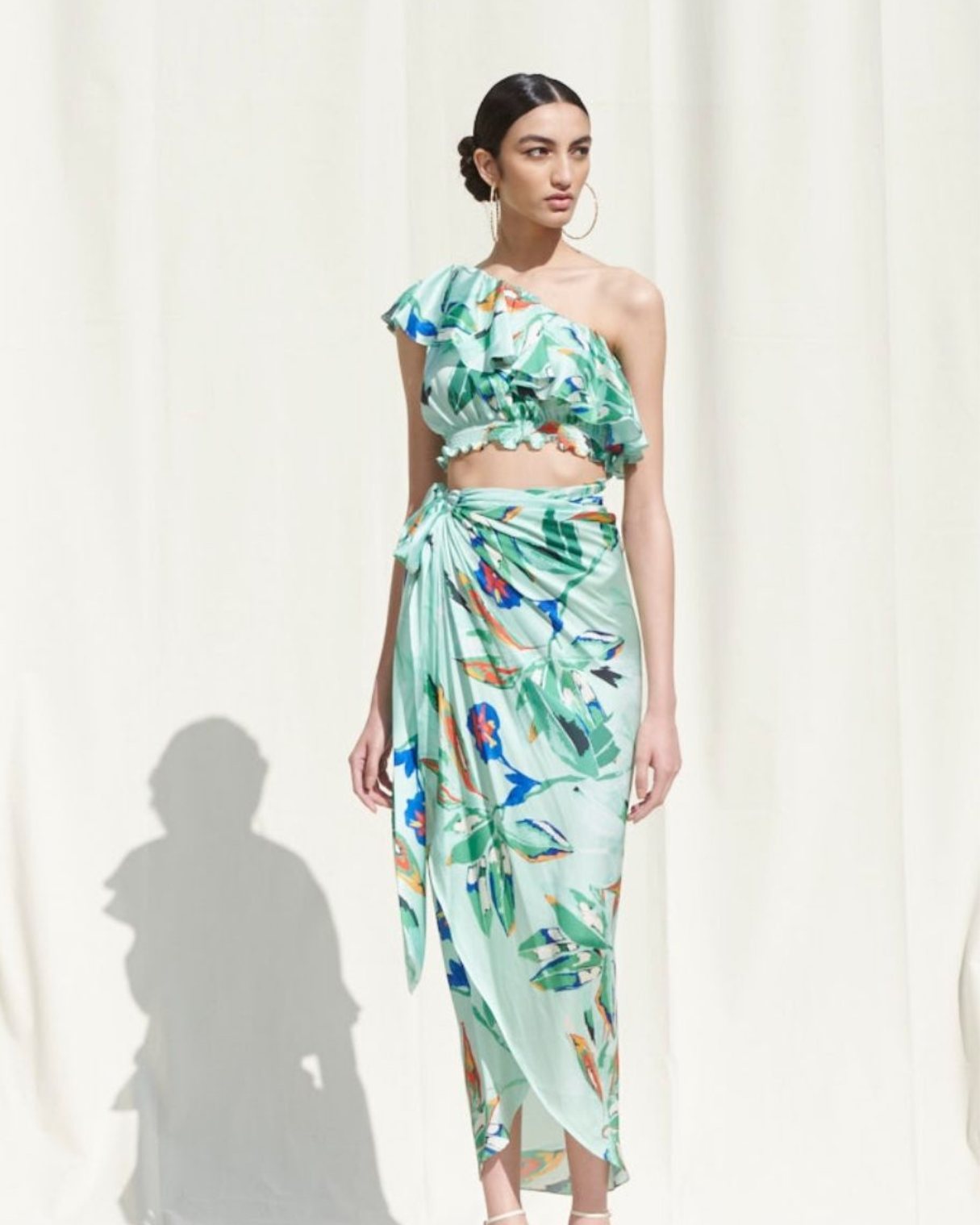 Crop Top Paired With A Printed Wrap Around Skirt for women by Mandira Wirk
