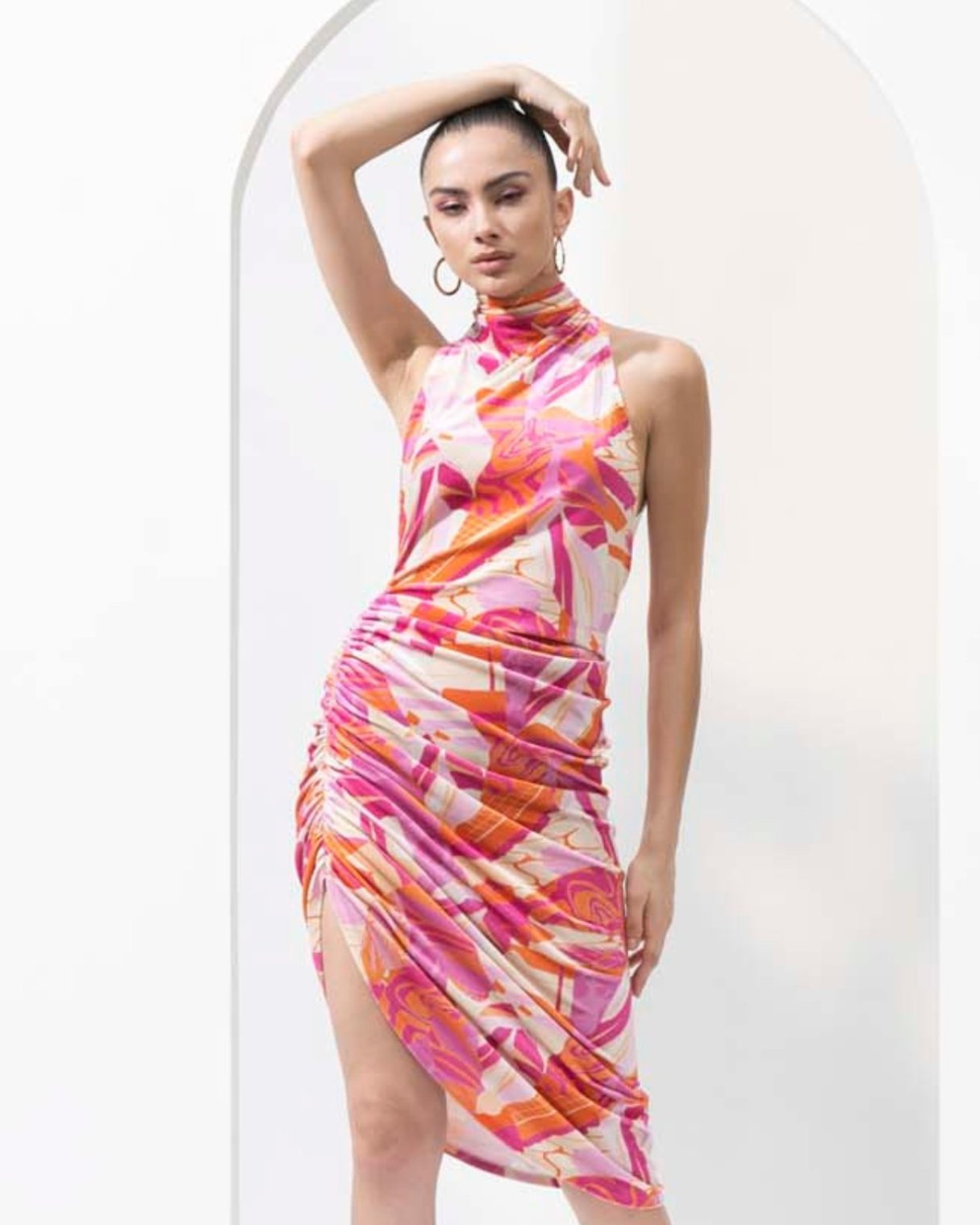 Pink abstract lycra velvet printed short dress with ruched detailing.