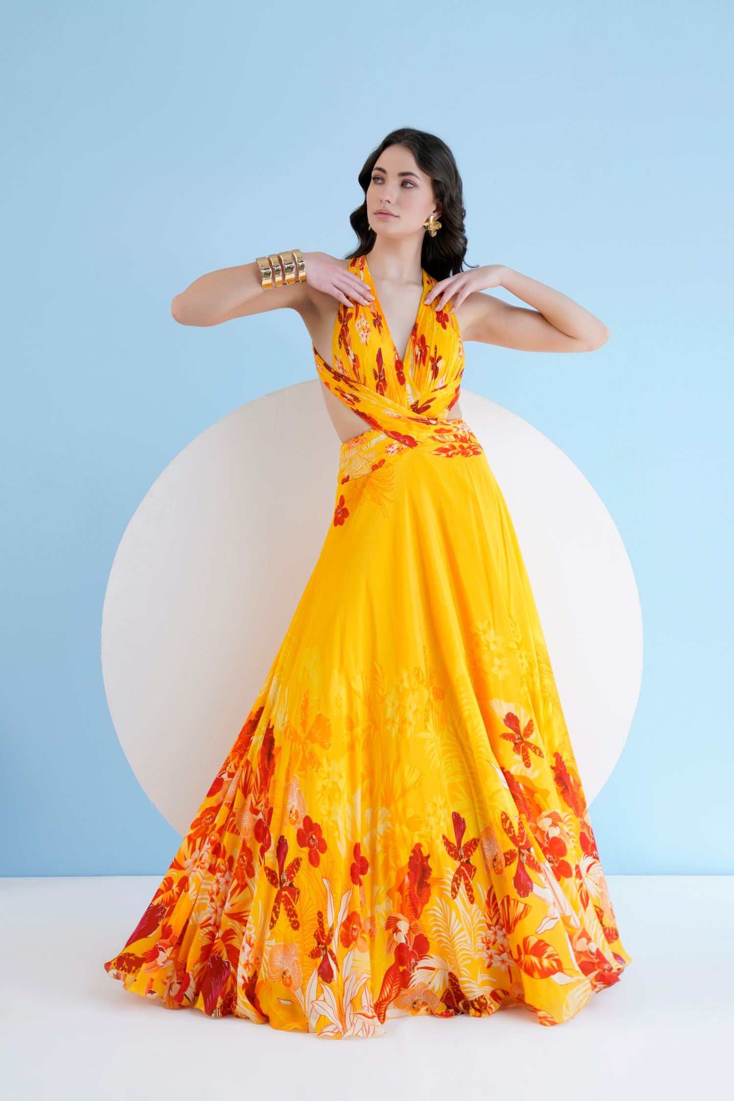 Orchid Yellow Printed Long Dress With Halter Neckline
And Waist Cutout