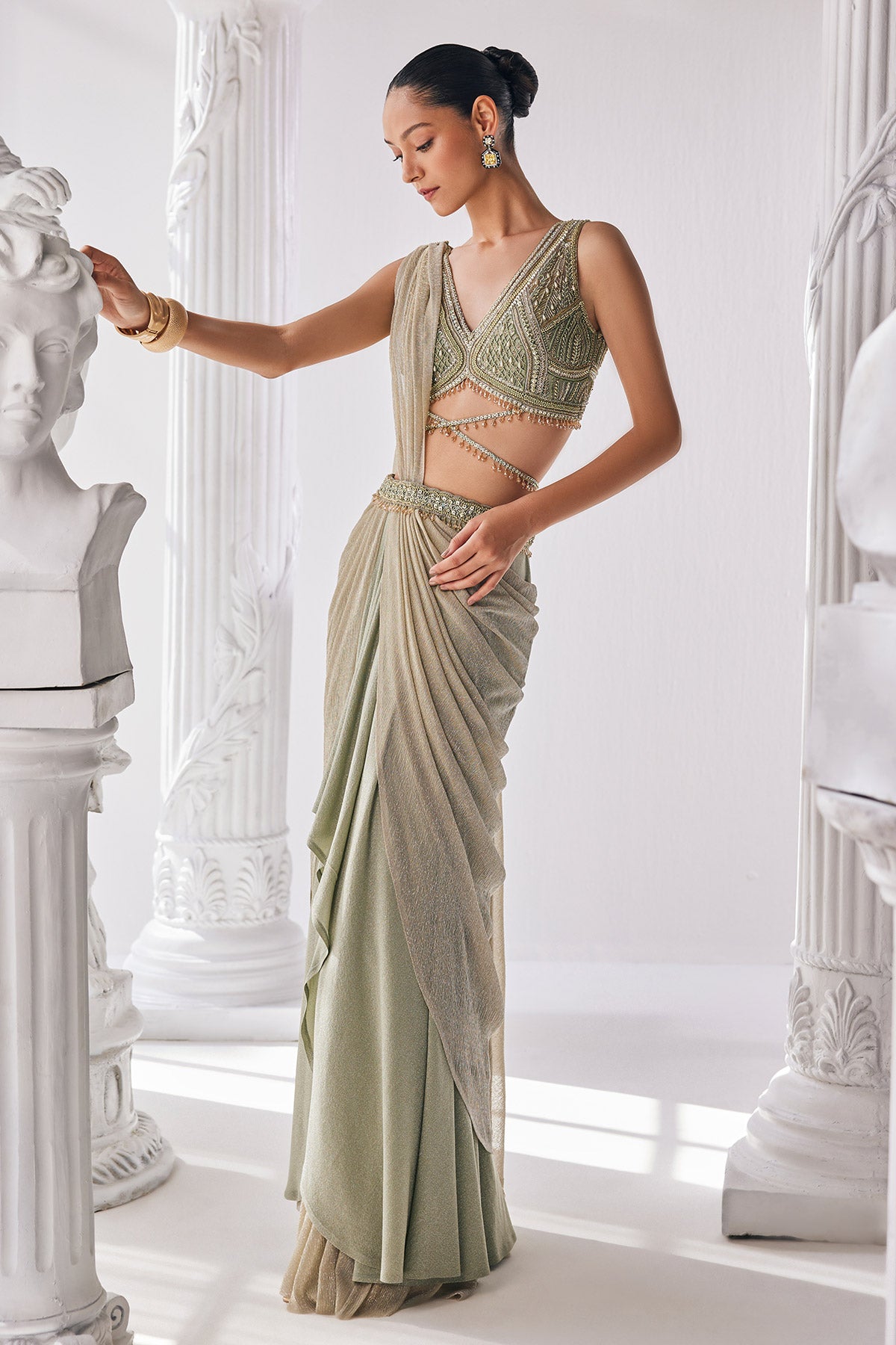 Jade Green Coloured Draped Saree In Lycra And Crinkle Fabric. It Features A Plunging Neck Blouse With Beadwork And Sequin Detailing.