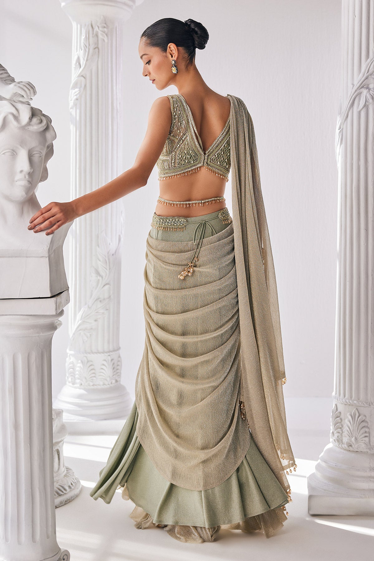 Jade Green Coloured Draped Saree In Lycra And Crinkle Fabric. It Features A Plunging Neck Blouse With Beadwork And Sequin Detailing.