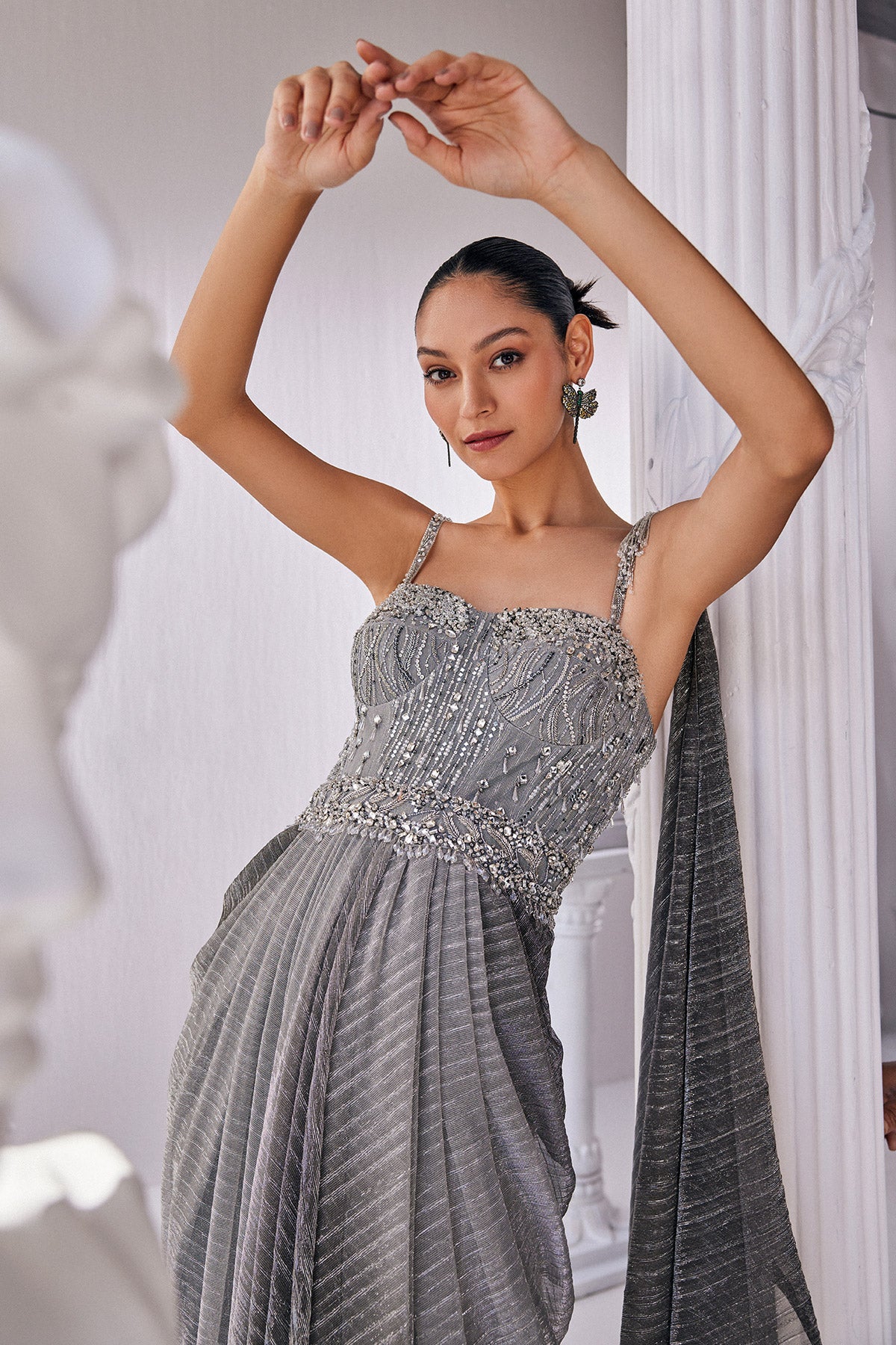 Ombre Draped Saree Gown In A Metallic Crinkle Fabric. It Is Constructed Witha Fitted Corset Bodice In Sequin And Beadwork.