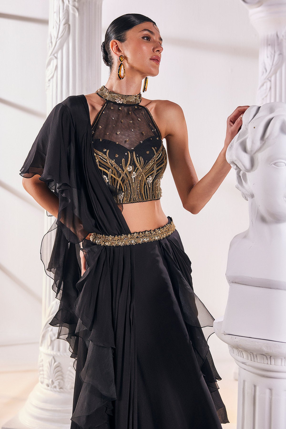 Draped Saree In Chiffon Paired With An Embroidered Organza Blouse And A Belt.