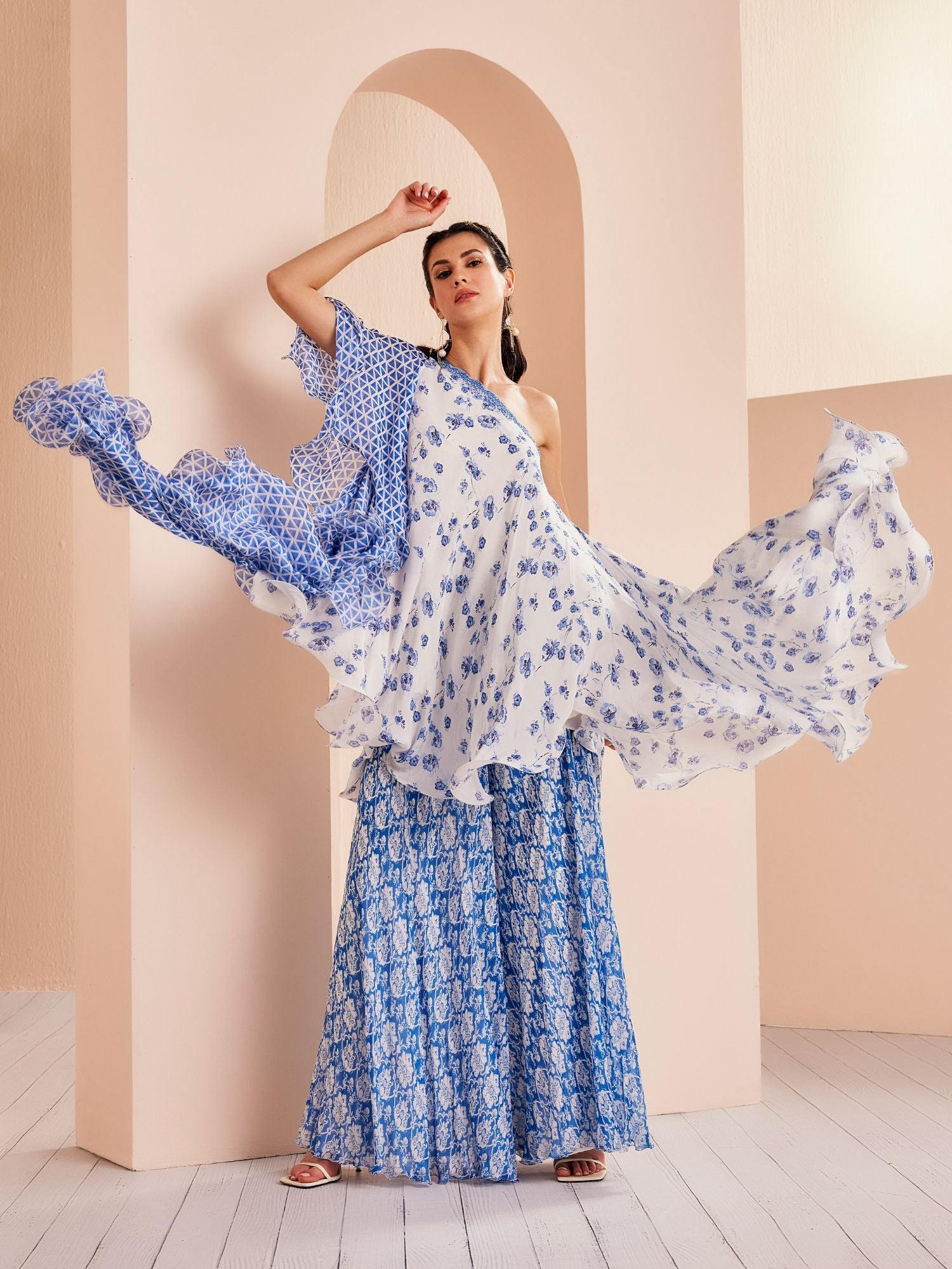 Blue printed one shoulder stylized chiffon top with sharara