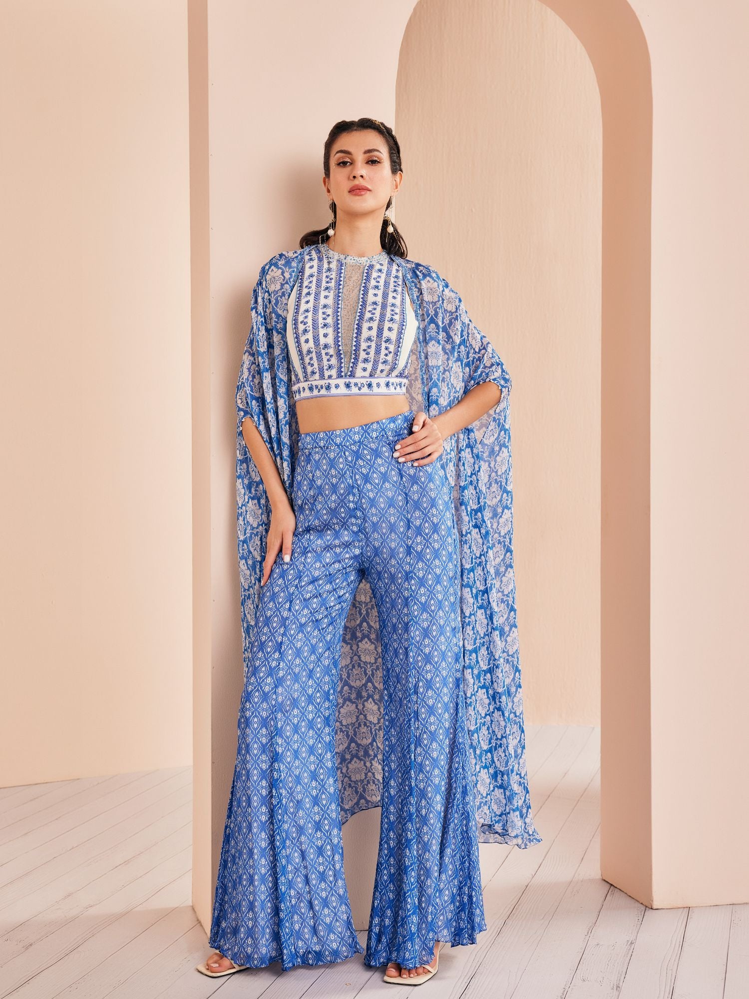 Blue printed embroidered blouse with sharara and cape