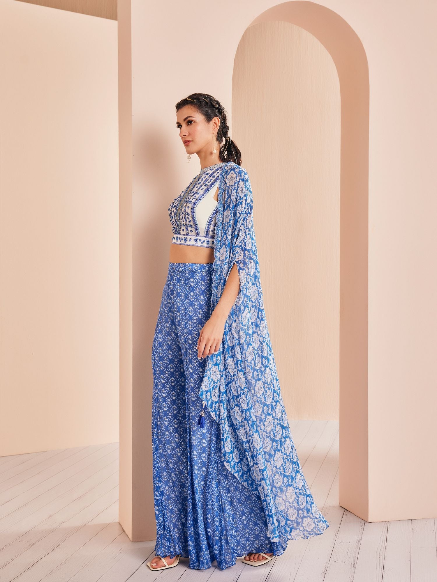 Blue printed embroidered blouse with sharara and cape