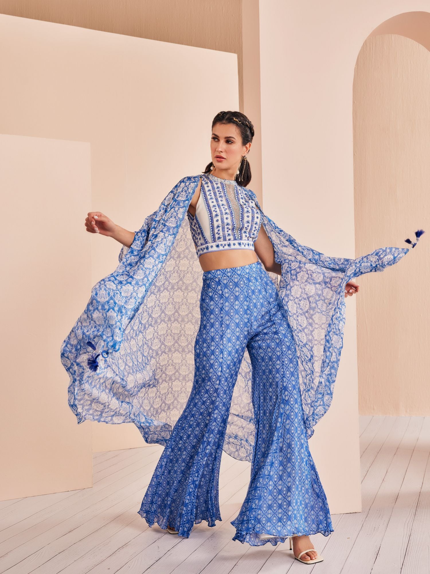 Blue printed embroidered blouse with sharara and cape