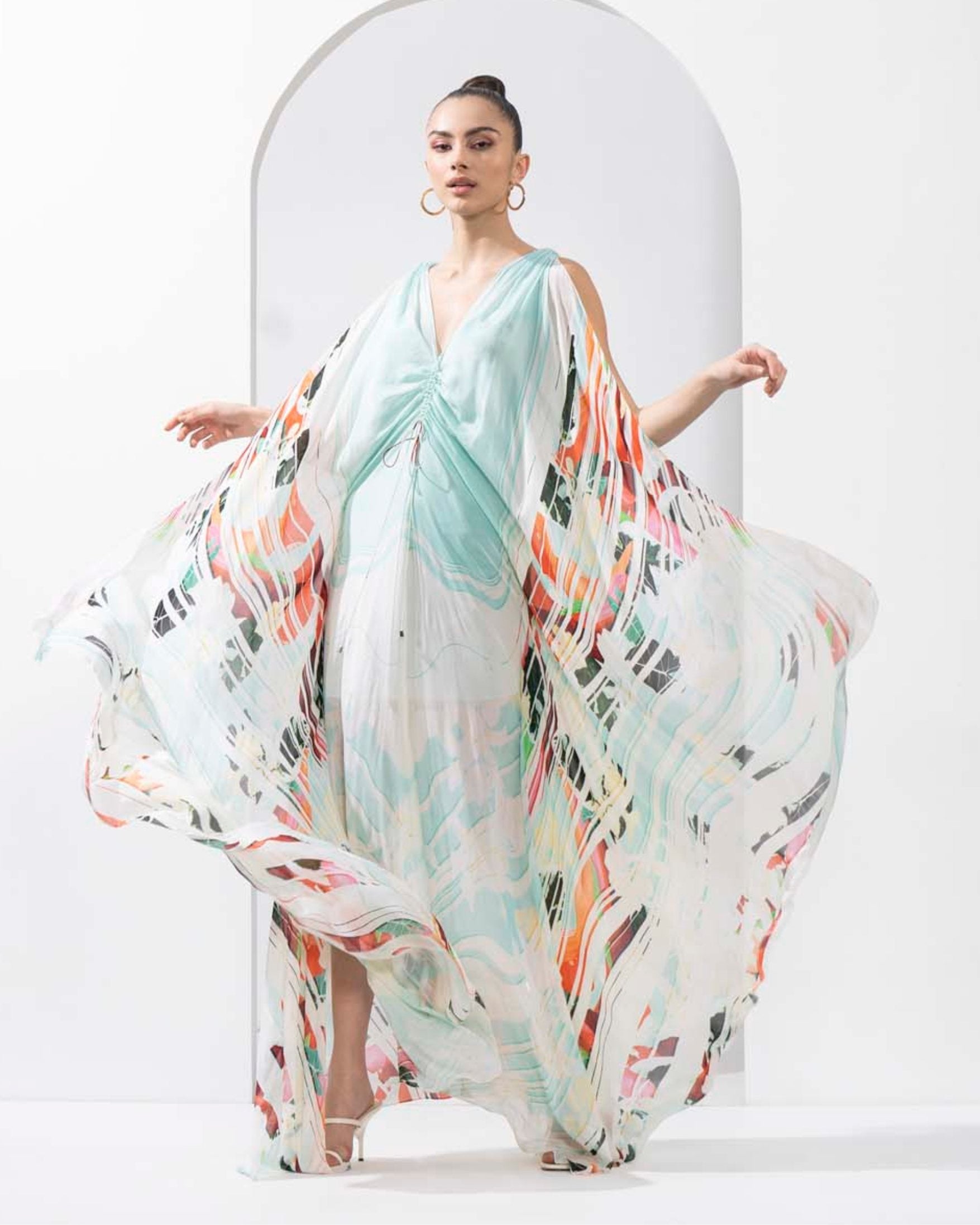 Ocean blue placement printed chiffon kaftan with an A-line hem and ruched detailing.