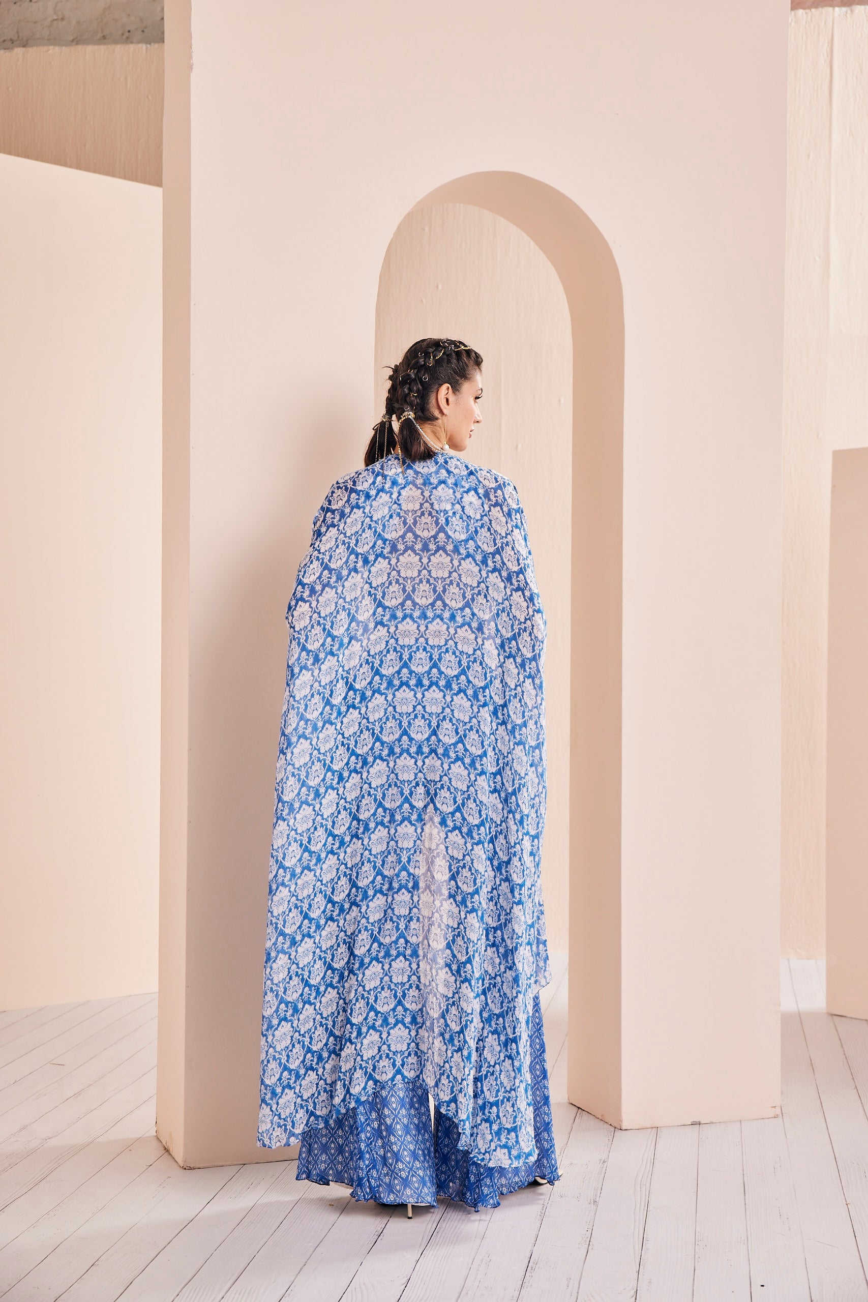 Blue printed embroidered blouse with sharara and cape