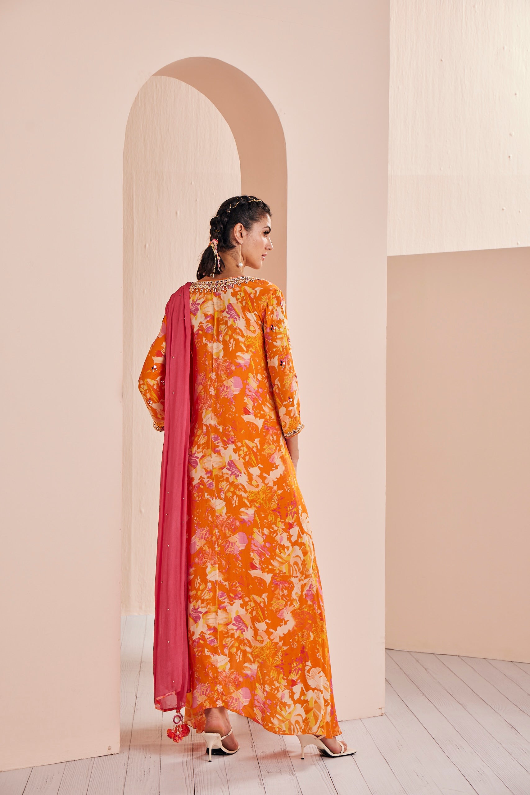 Printed crepe asymmetric embroidered tunic complimenting with dhoti and dupatta