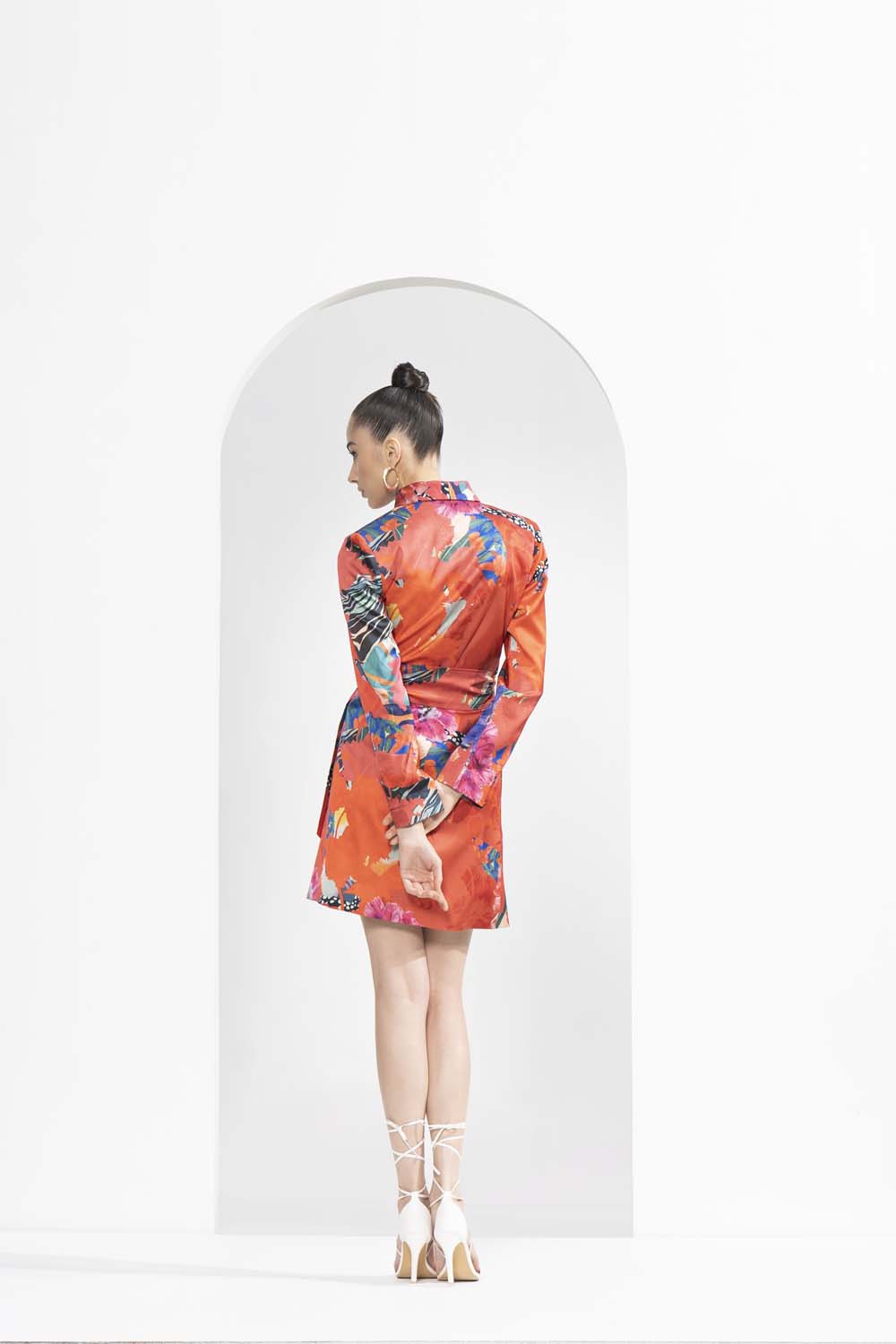 Red garden printed lustrous satin wrapped blazer dress.