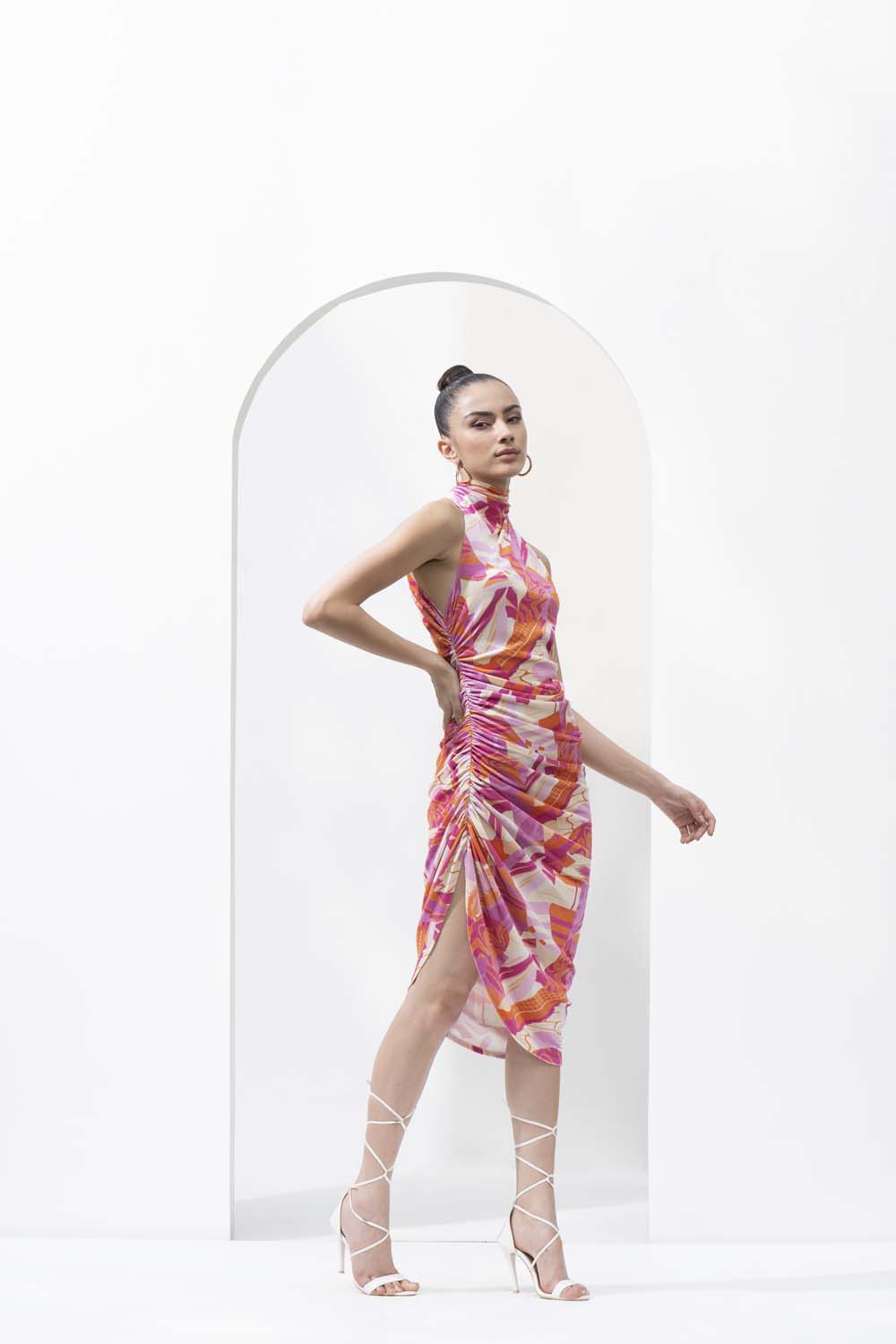 Pink abstract lycra velvet printed short dress with ruched detailing.