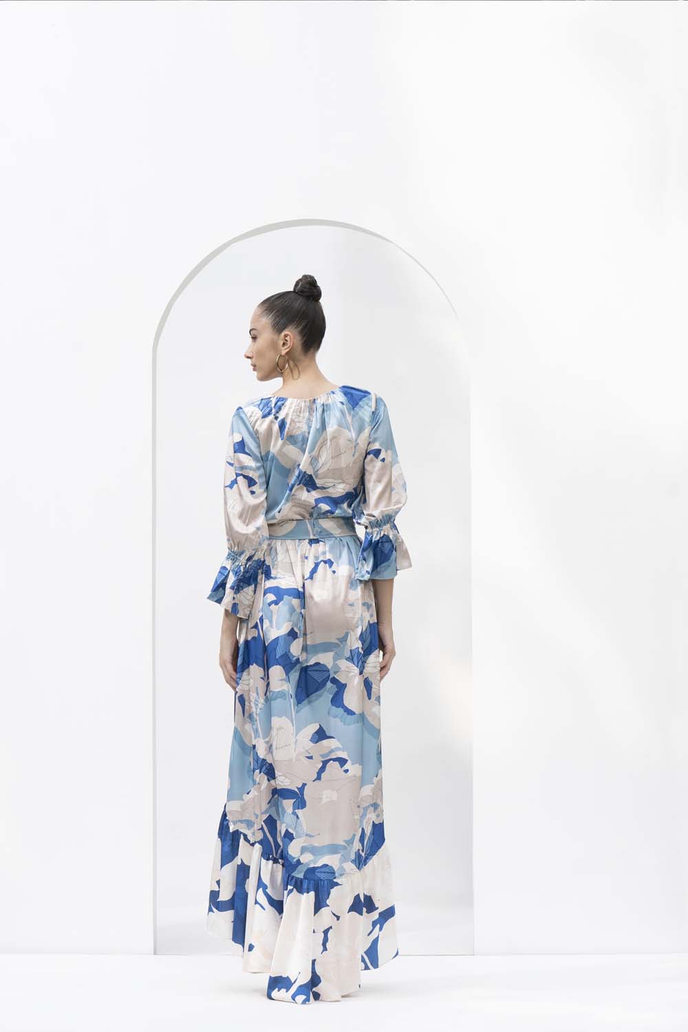 Mystic blue texture printed dress with an asymmetric hemline.
