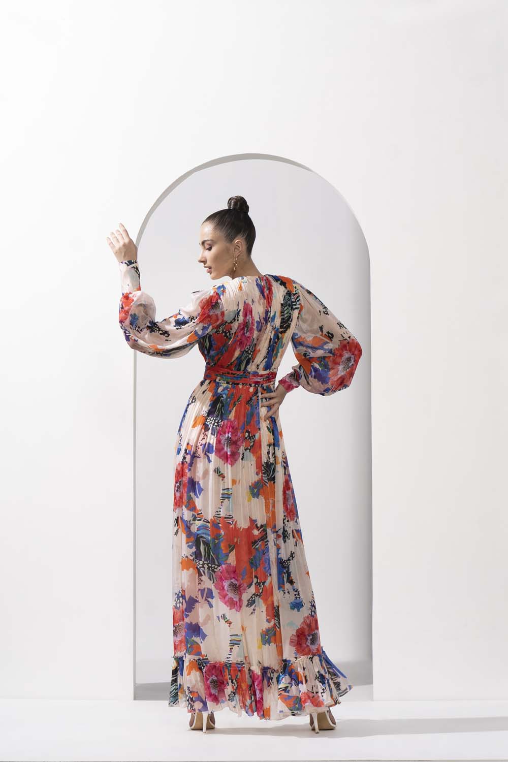 Ivory garden printed chiffon featuring abstract floral motifs with a slit and asymmetric hem.