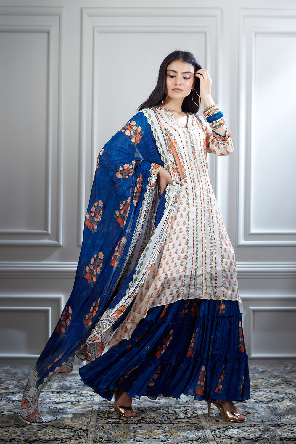 Ivory printed and mirror embellished tunic with sharara and dupatta