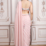 A Pastel Pink Drape Saree With A Hand Embroidered Blouse