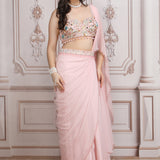 A Pastel Pink Drape Saree With A Hand Embroidered Blouse
