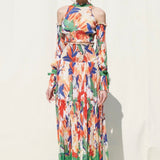 Skirts With Smocking On Its Waist Paired With A Halter Crop Top