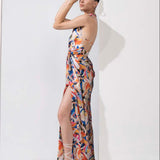 Abstract printed draped halter neck dress