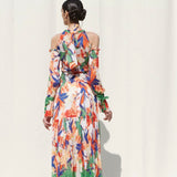 Skirts With Smocking On Its Waist Paired With A Halter Crop Top