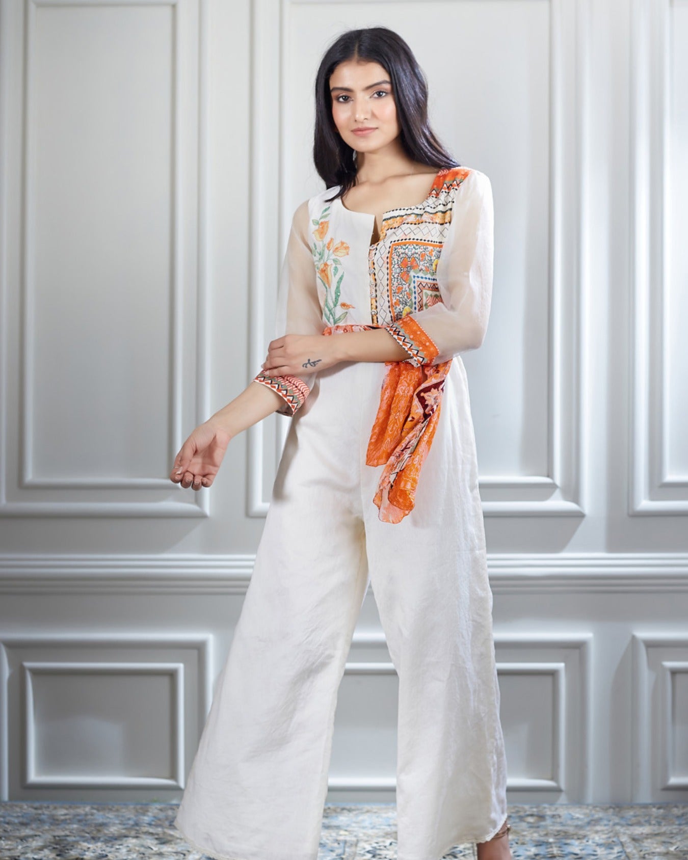 A hand embroidered and printed chanderi jumpsuit.
