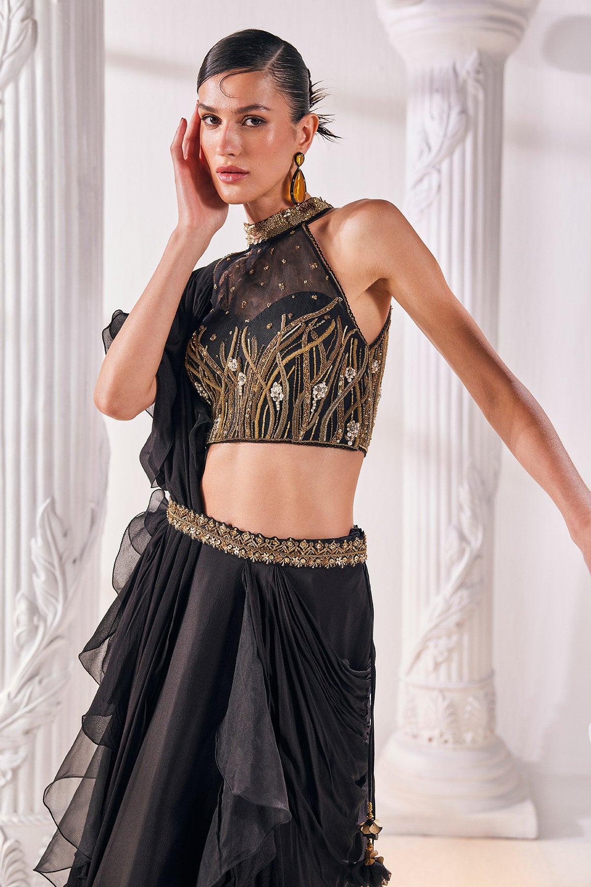 Draped Saree In Chiffon Paired With An Embroidered Organza Blouse And A Belt.