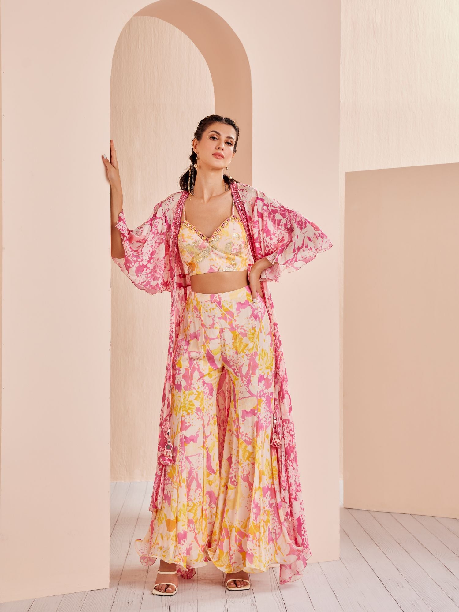 Pink sweet pea printed blouse paired with sharara and cape