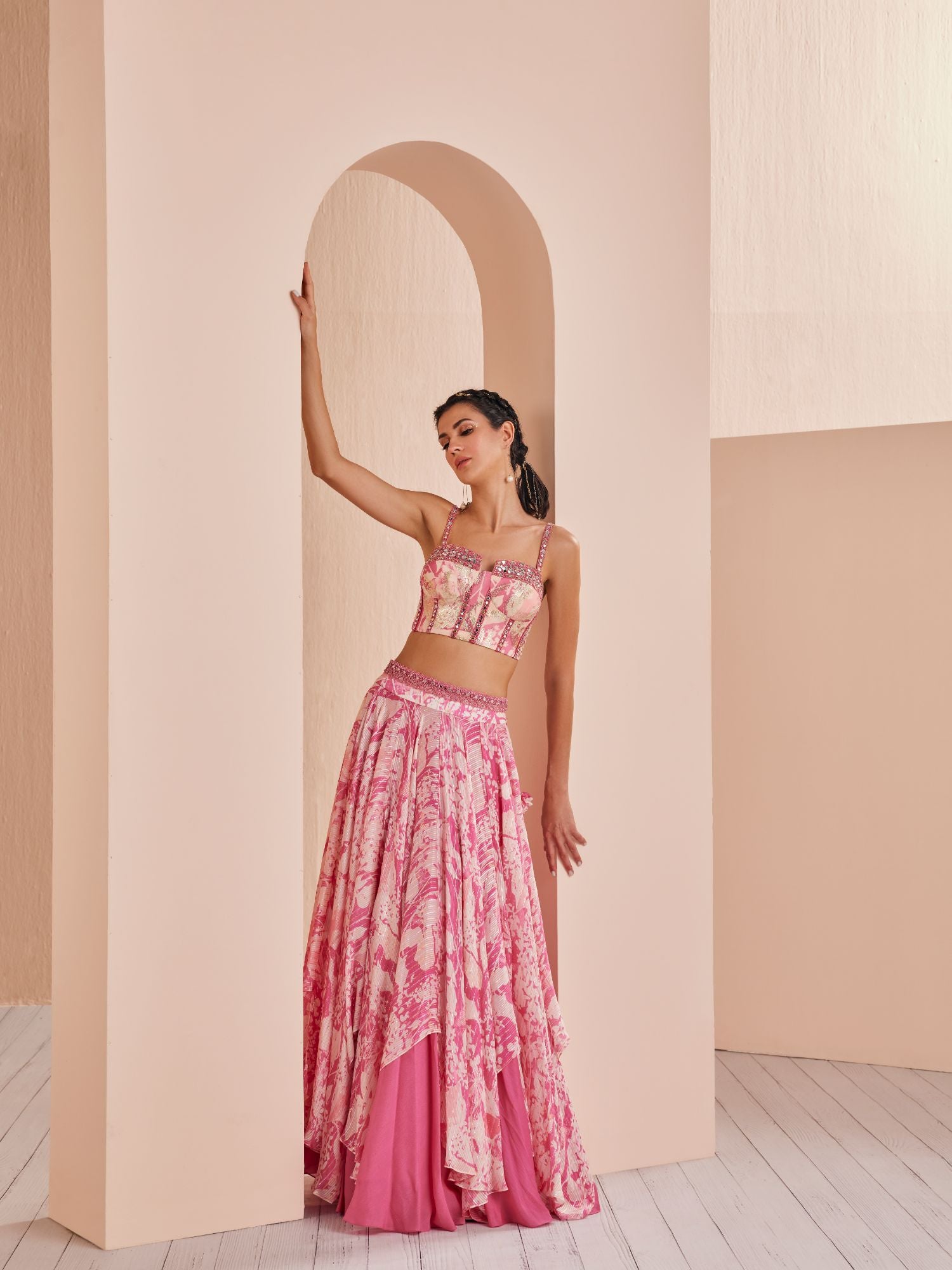 Printed chiffon lehenga paired up with blouse and cape