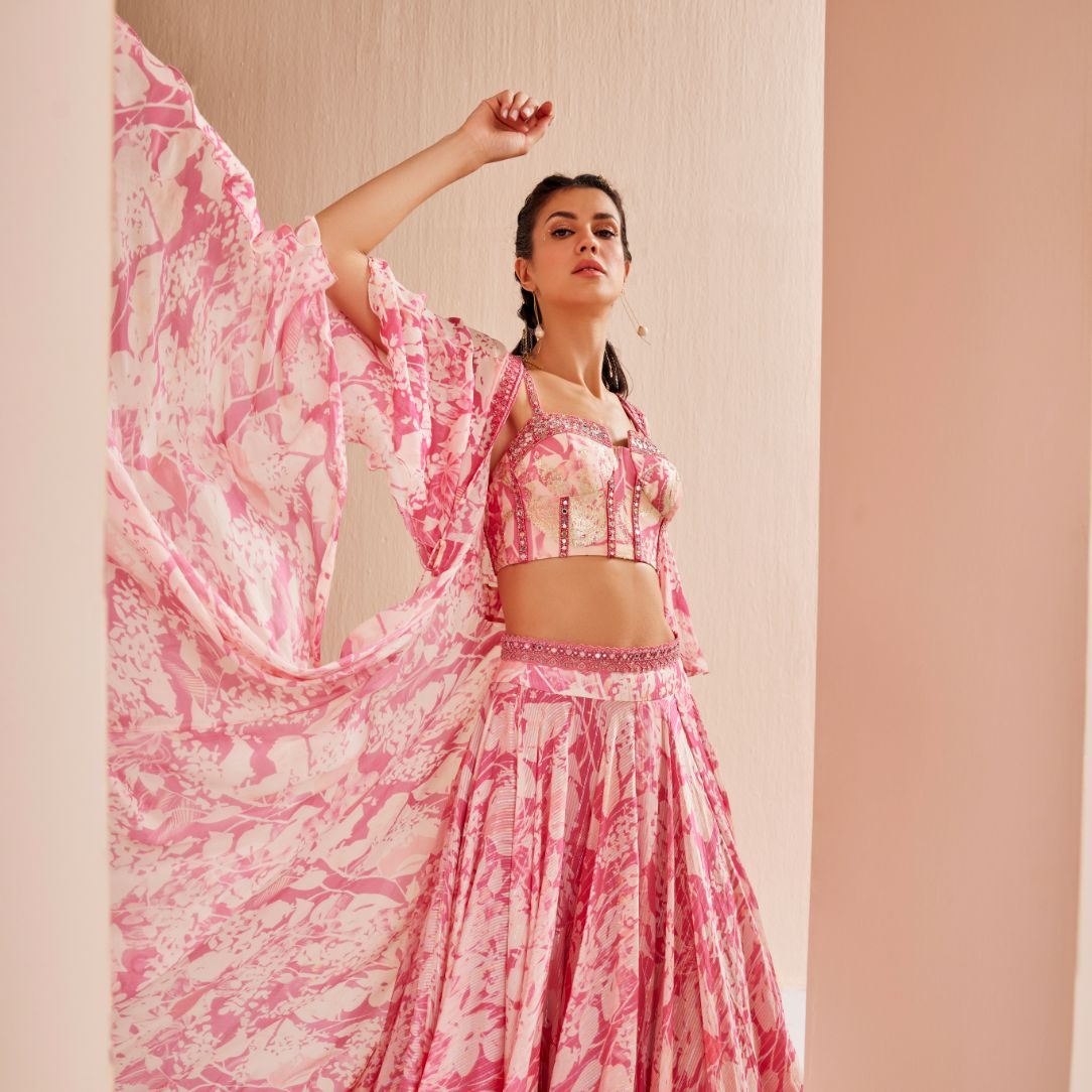 Printed chiffon lehenga paired up with blouse and cape