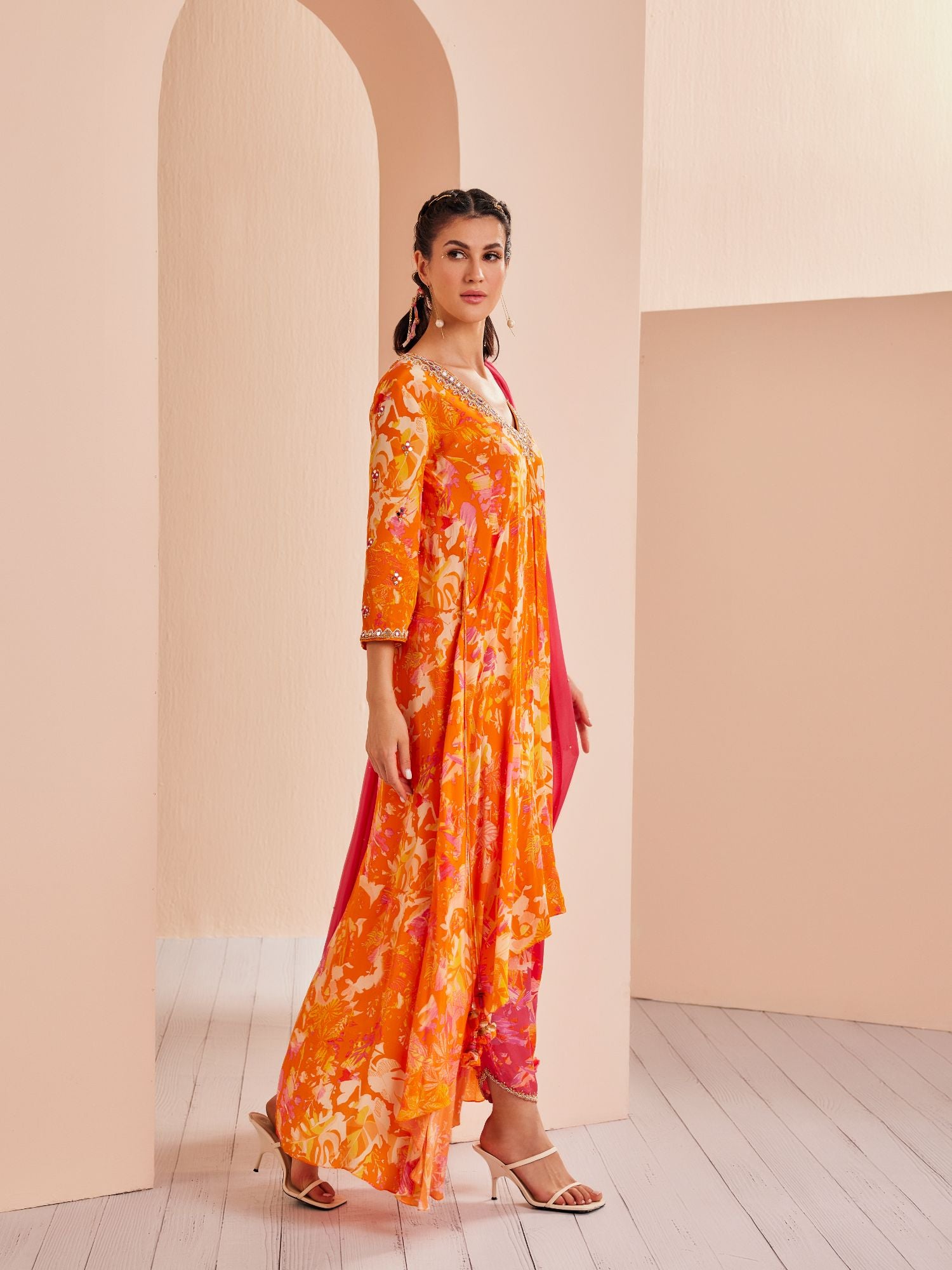 Printed crepe asymmetric embroidered tunic complimenting with dhoti and dupatta