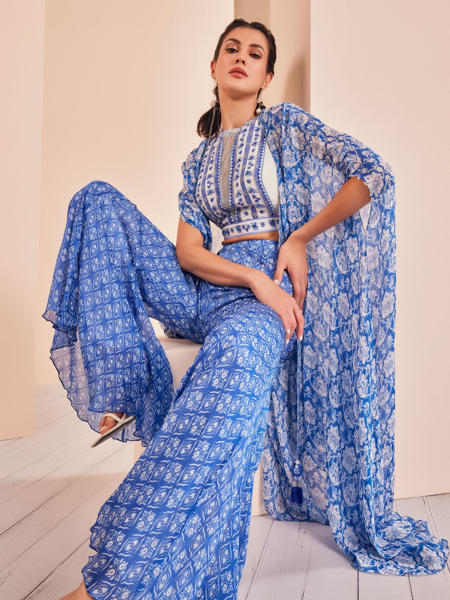 Blue printed embroidered blouse with sharara and cape