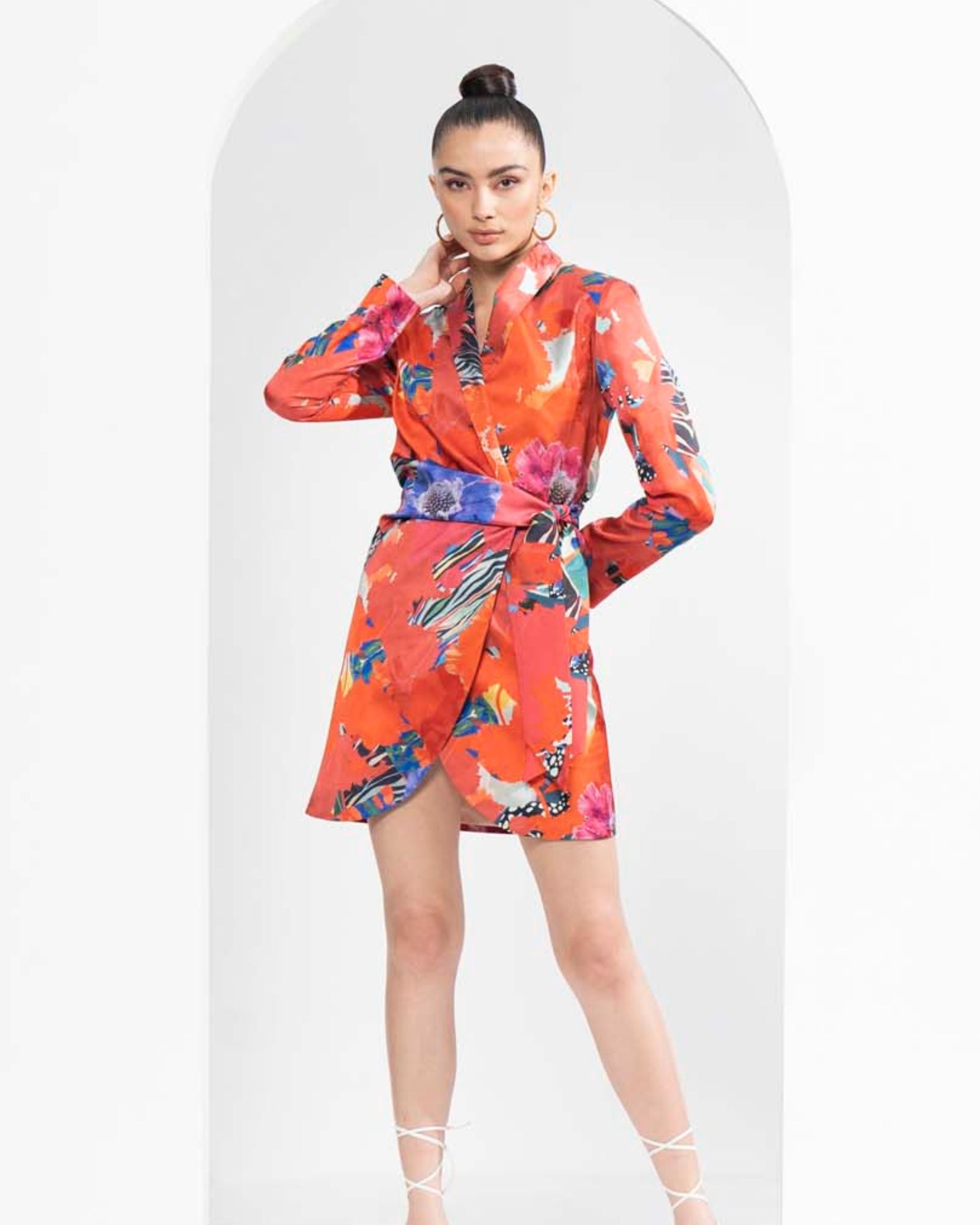 Red garden printed lustrous satin wrapped blazer dress.