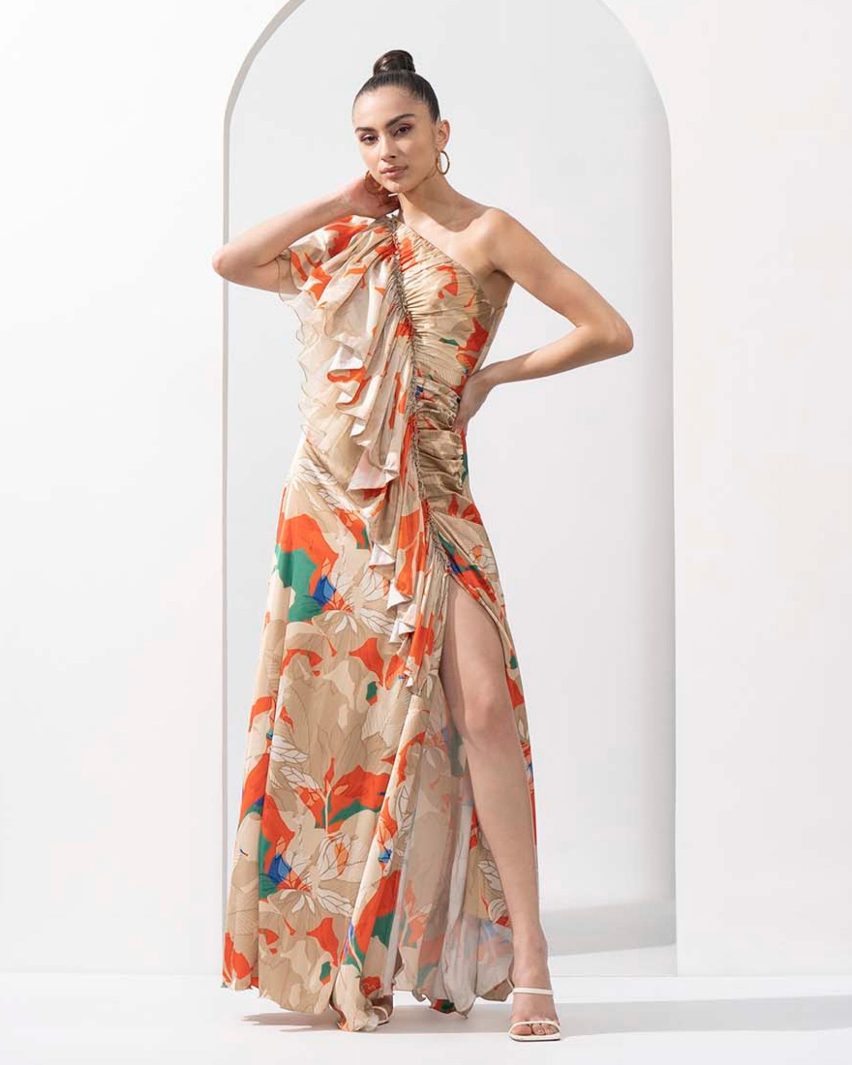 Mystic orange printed lustrous satin one-shoulder dress with solid organza frill detail.