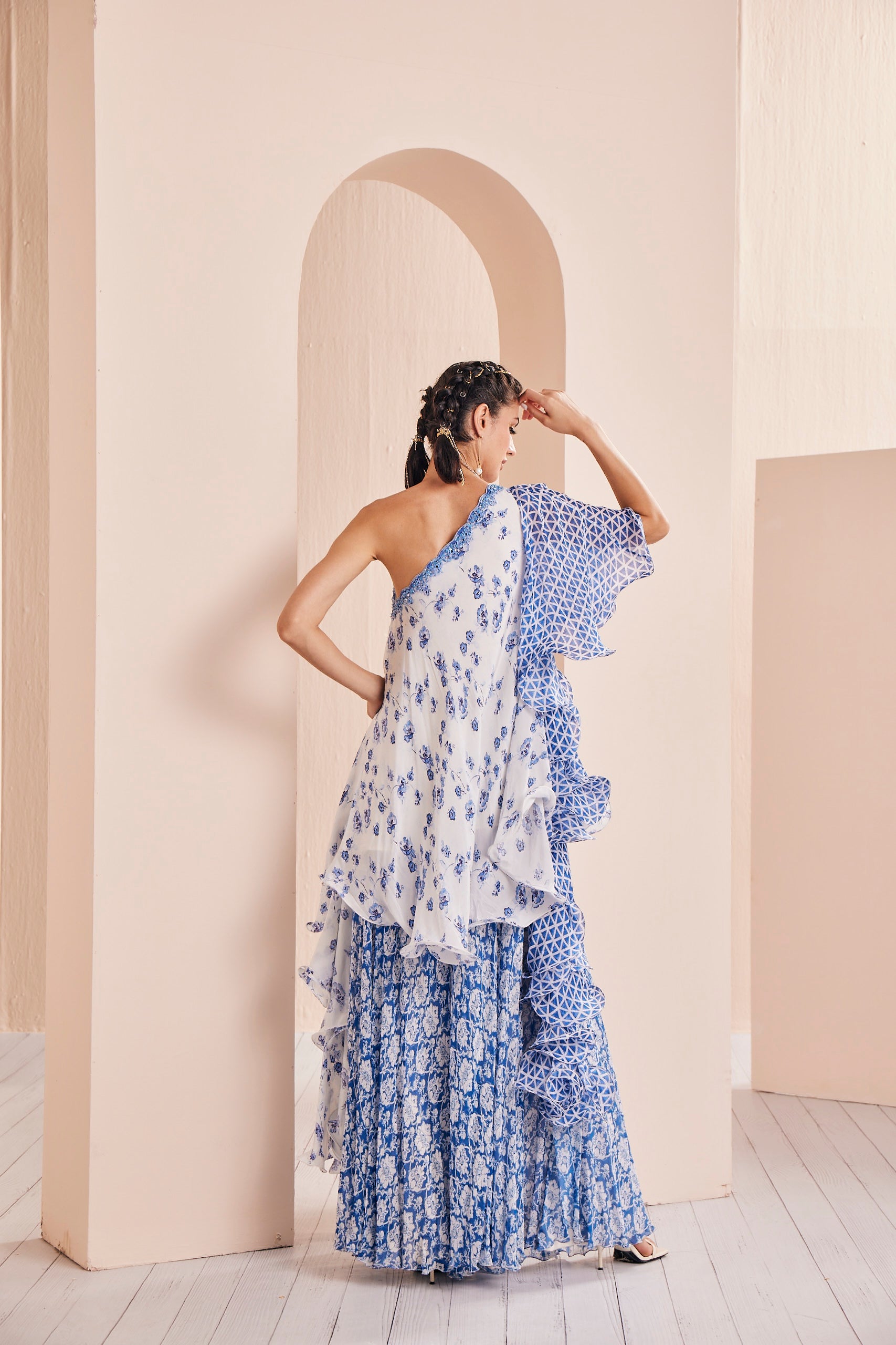 Blue printed one shoulder stylized chiffon top with sharara