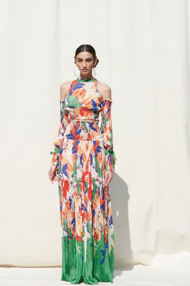 Skirts With Smocking On Its Waist Paired With A Halter Crop Top