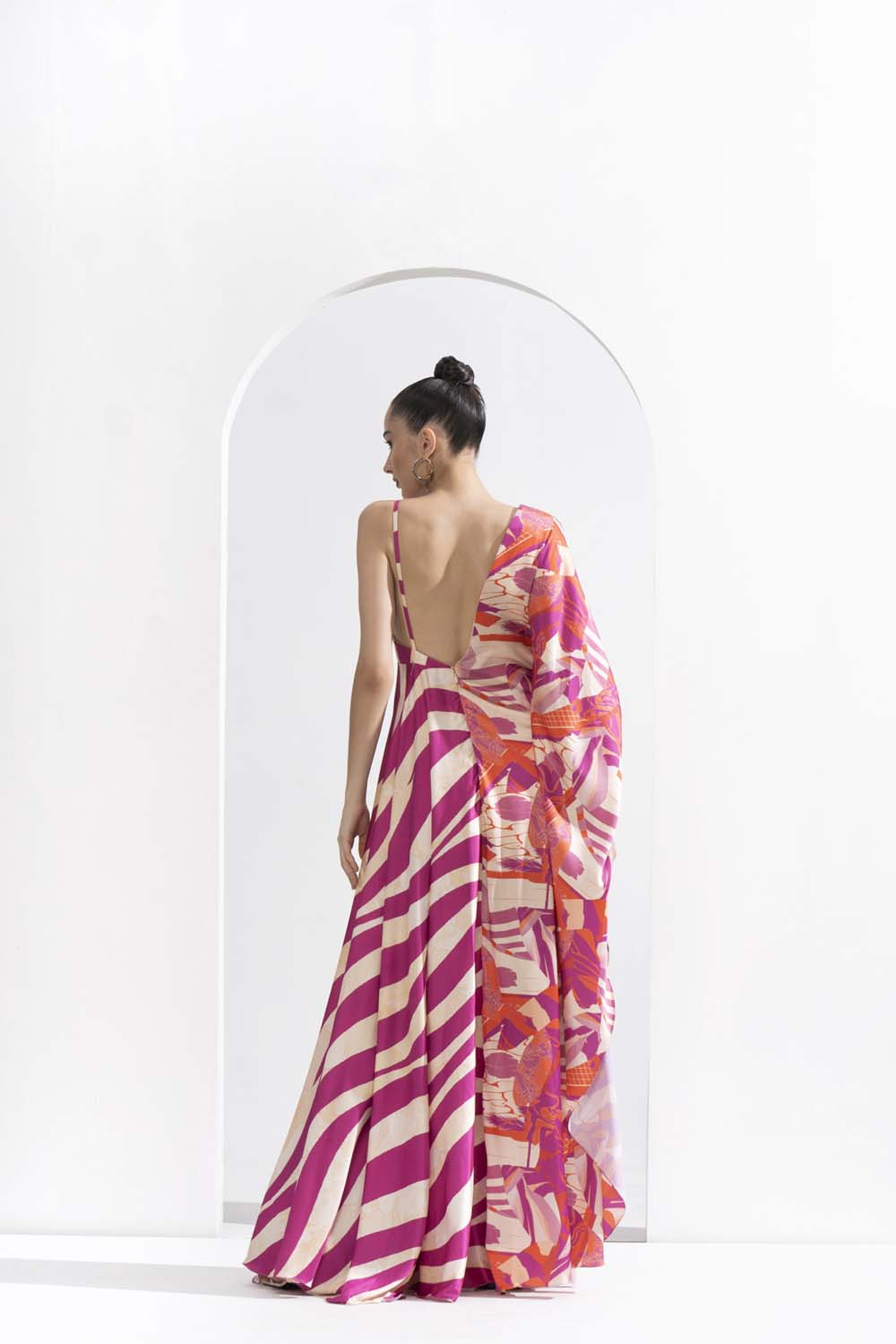 Fuchsia print blocked kaftan made from lustrous satin with a deep back.