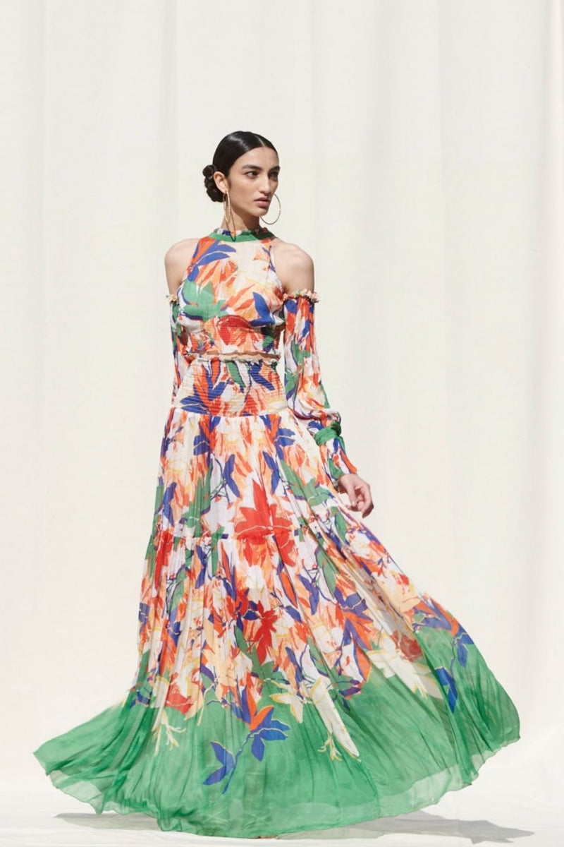 Skirts With Smocking On Its Waist Paired With A Halter Crop Top