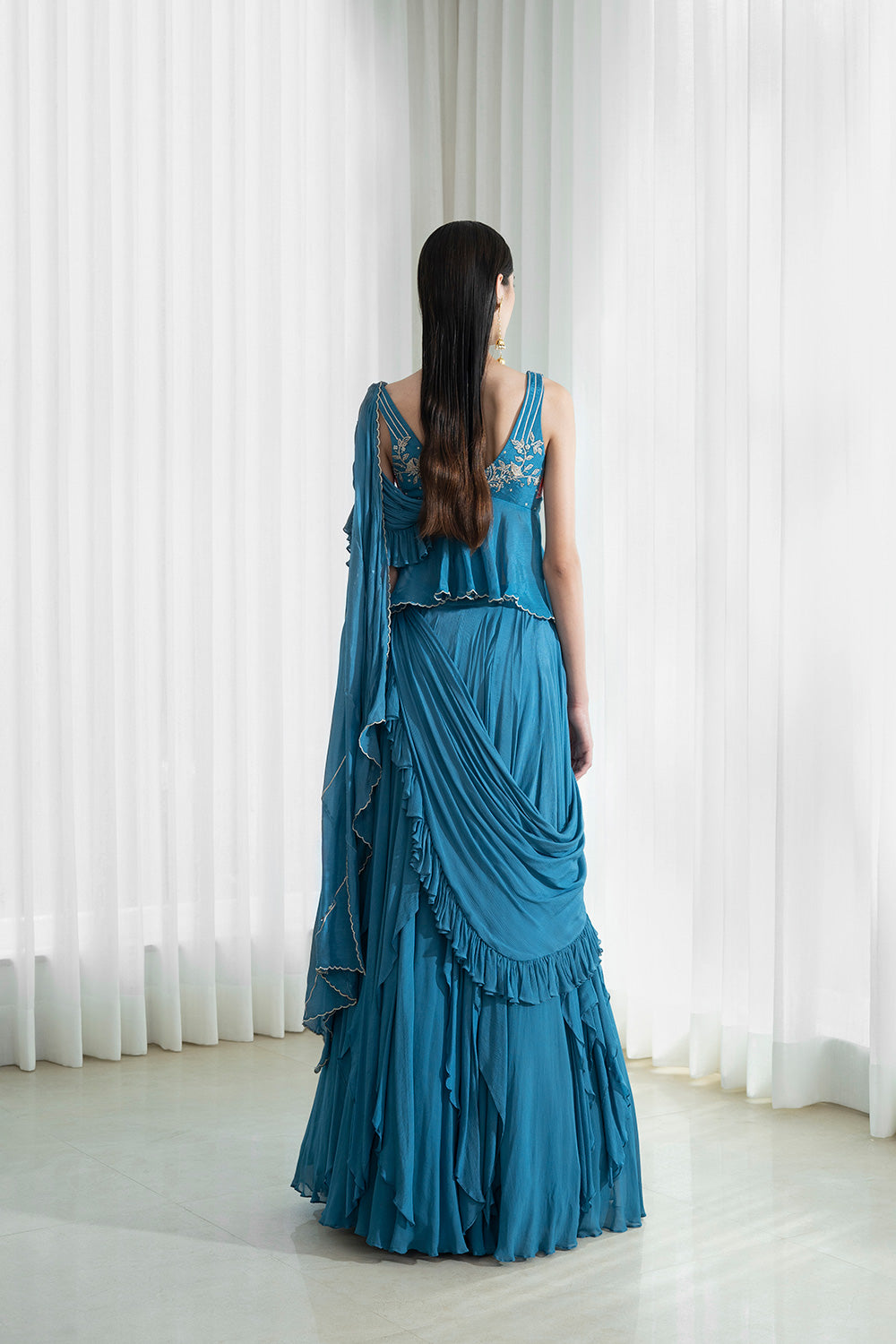 Drape Saree With Frill And Flares On Skirt Styled With Blouse