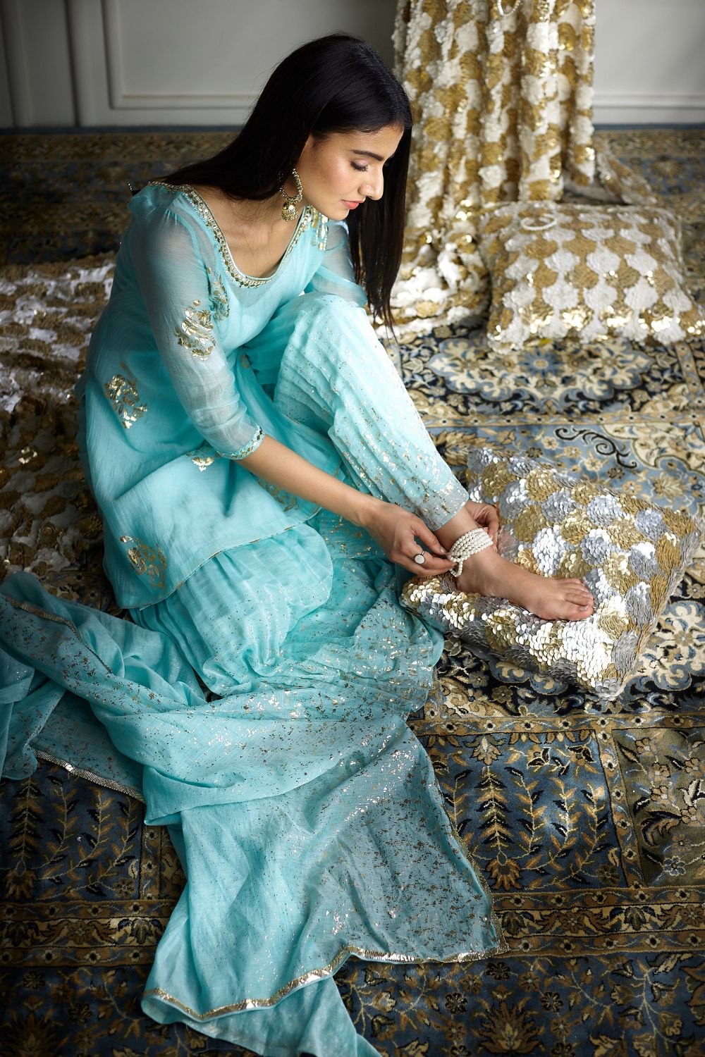 Aqua foil printed hand embroidered kurta paired with sharara and dupatta