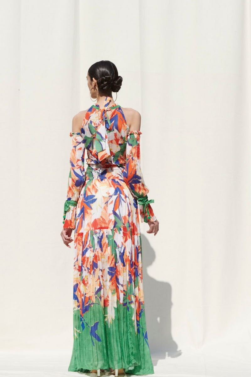 Skirts With Smocking On Its Waist Paired With A Halter Crop Top