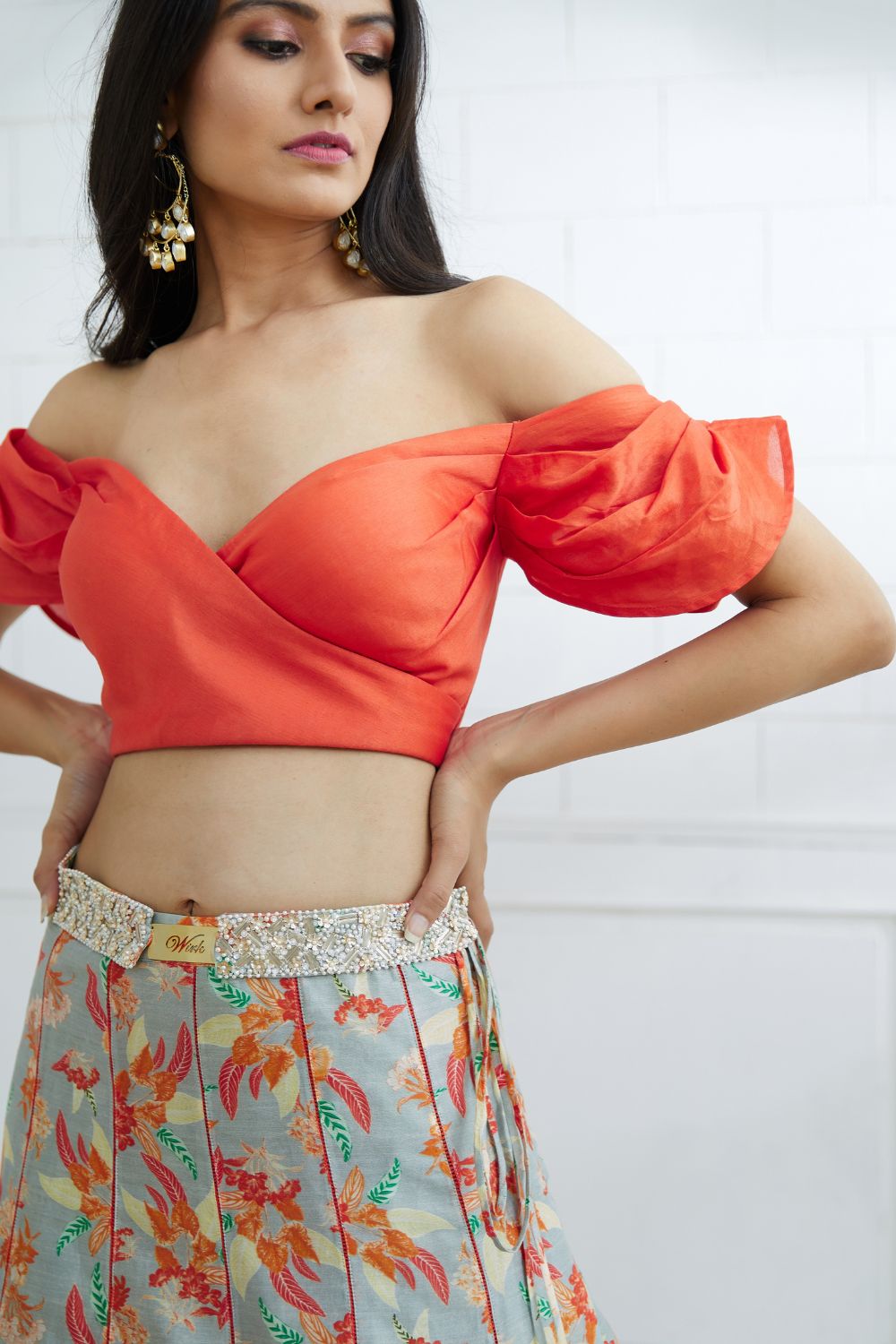 Orange Off Shoulder Blouse With Printed Lehenga