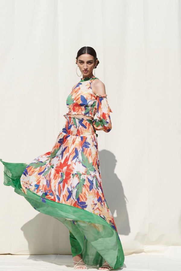Skirts With Smocking On Its Waist Paired With A Halter Crop Top