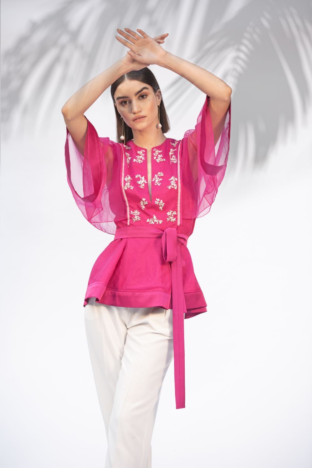 Hot Pink Peplum Top With Ivory Pants Set for women by Mandira Wirk