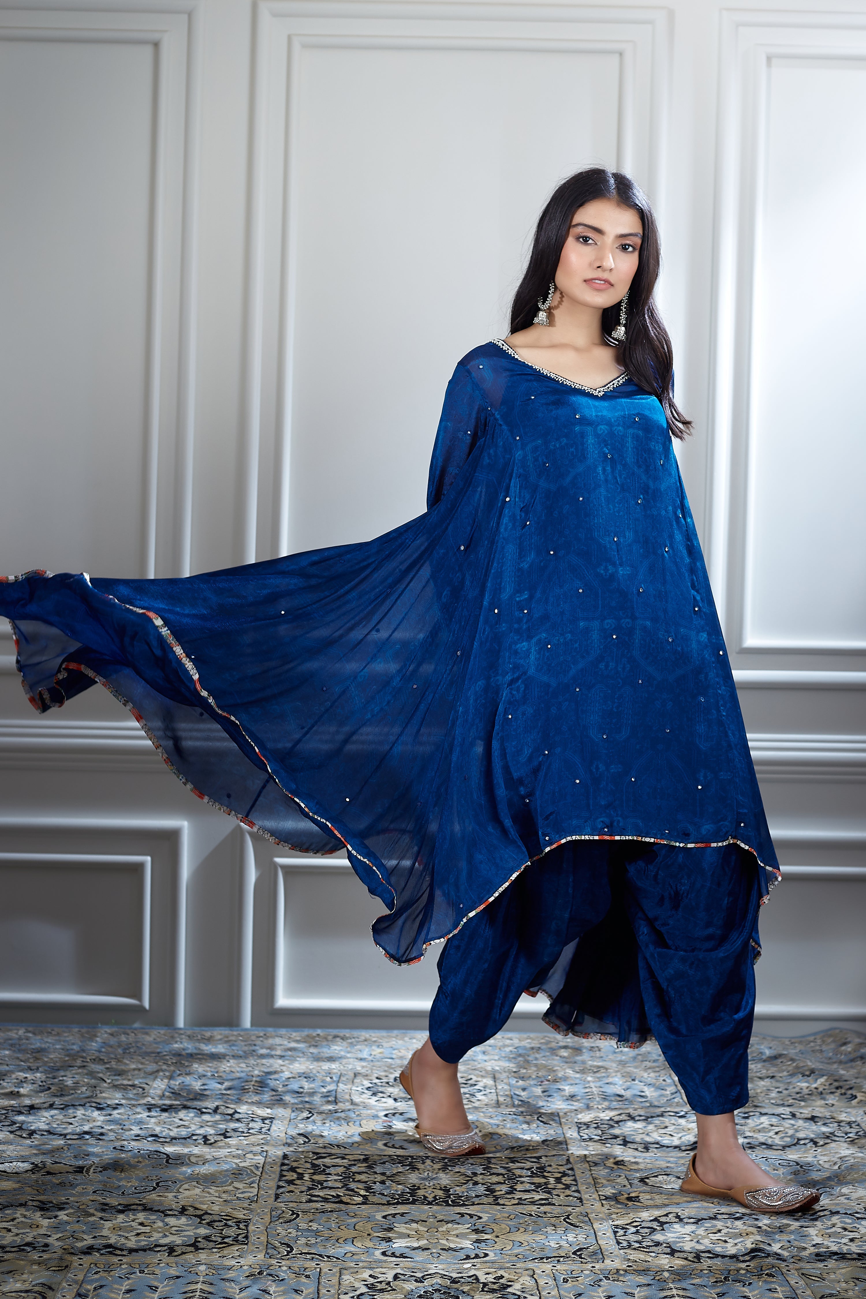 Printed and hand highlighted asymmetric tunic dhoti and dupatta