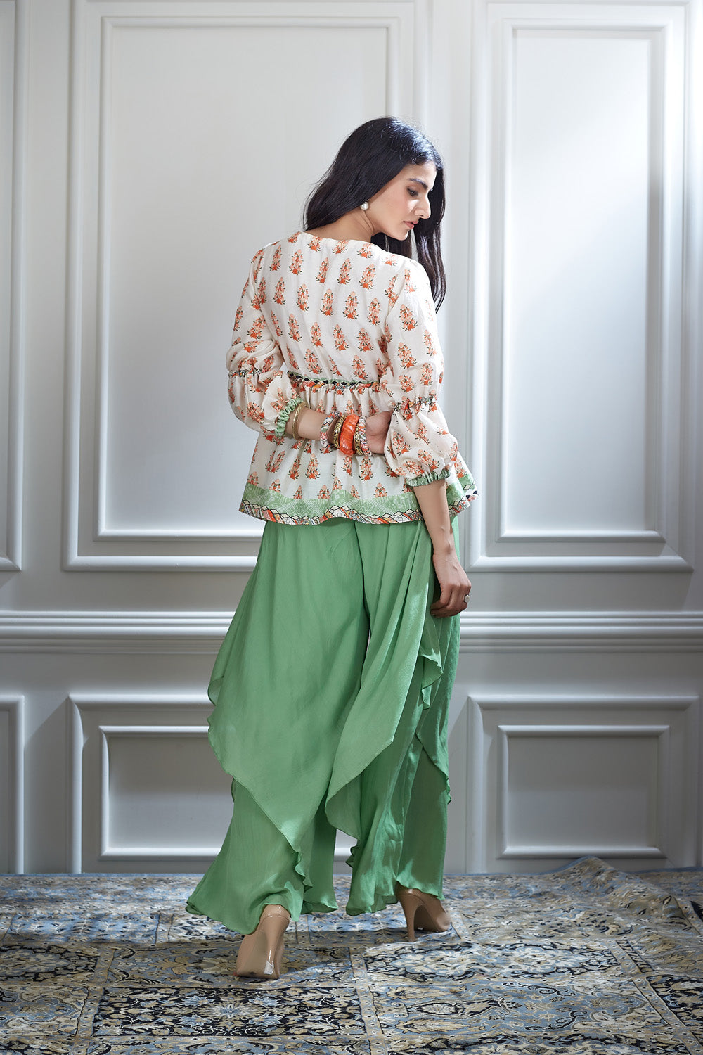A printed ivory peasant top paired with a double-layer bias sharara.